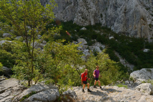 Hikers in the  Paklenica National Park, Velebit rewilding area, Croatia.