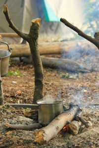 Preparing coffee on the campfire. 