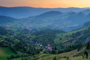 Valley and village in the Carpathian Mountains, Romania