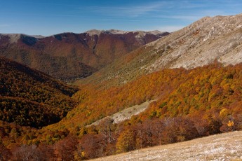 Autumn colors on mountains and forests in the Abruzzo National Park at sunrise