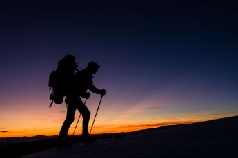 Hiker on Majella's altitude plateau at sunset