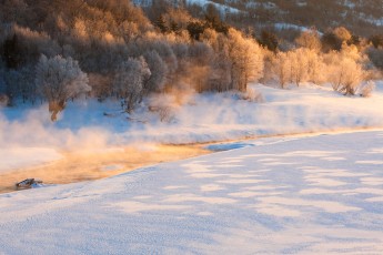 Steam rising from a stream on frosty winter morning in the Abruzzo National Park