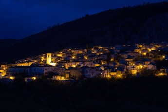 Nocturnal view of the medieval village of Ortona dei Marsi in the Abruzzo, Lazio and Molise NP. Abruzzo, Italy. May 2014