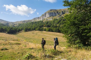 Hiker couple in Duchessa Mountains Nature Reserve. Lazio, Italy. August 2014