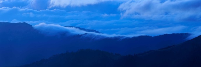 Deep hanging clouds at the alpine areas at the Leaota Mountain range, Carpathian Mountains, Romania