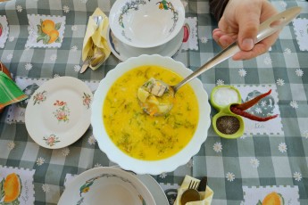 Fish soup serving at Mama Sika's guesthouse in Sfintu Gheorghe, Romania