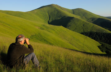 Wouter Helmer, Rewilding Director, at the Alpine grasslands in the Tarçu Mountains Natura 2000 site in Southern Carpathians rewilding area, Romania.