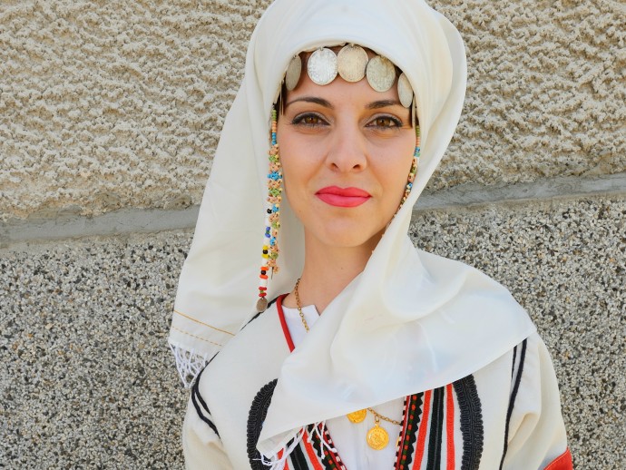 Young woman in traditional clothing in Kondovo village, Rhodope Mountains, Bulgaria.