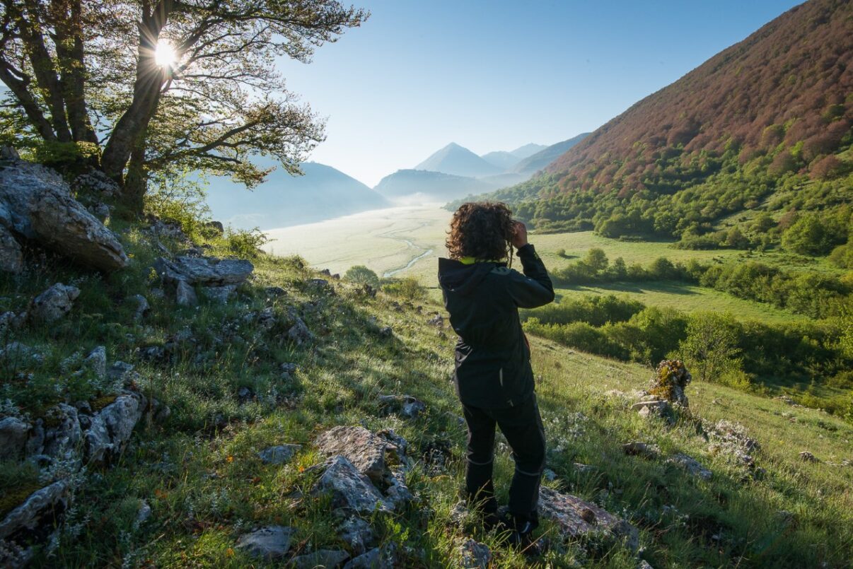 woman overlooking the Central Apennines rewilding landscape