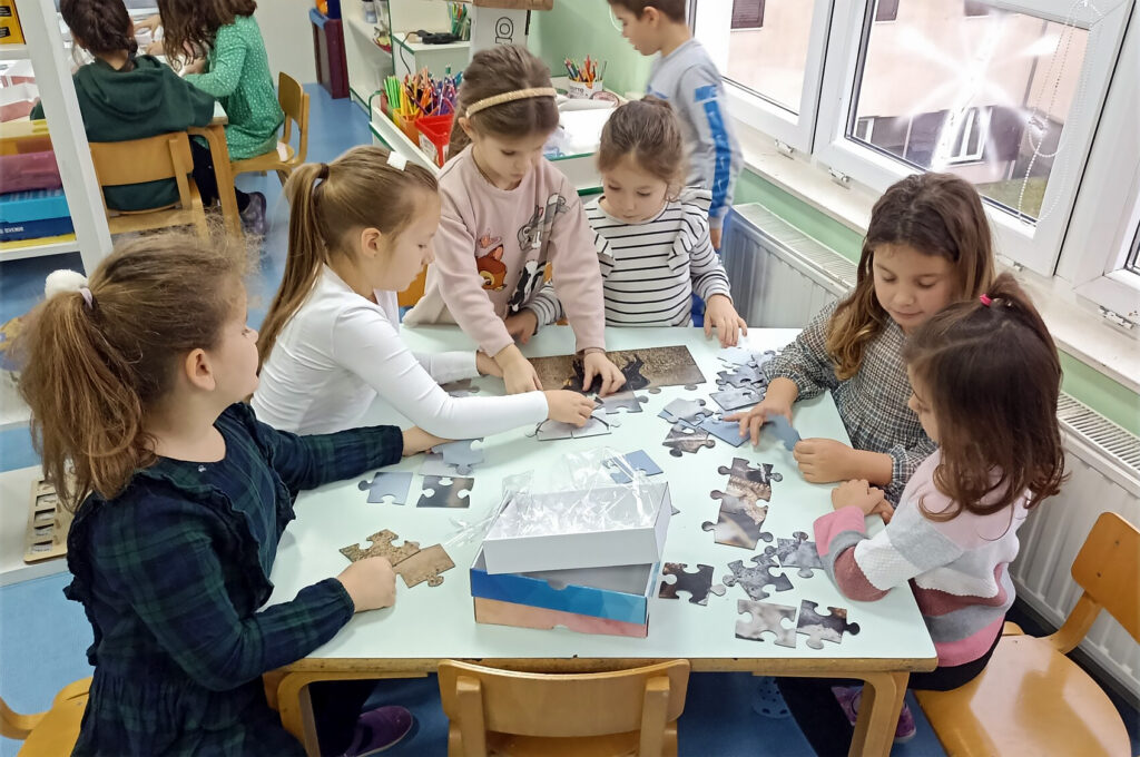 School children making puzzles of wildlife in Velebit