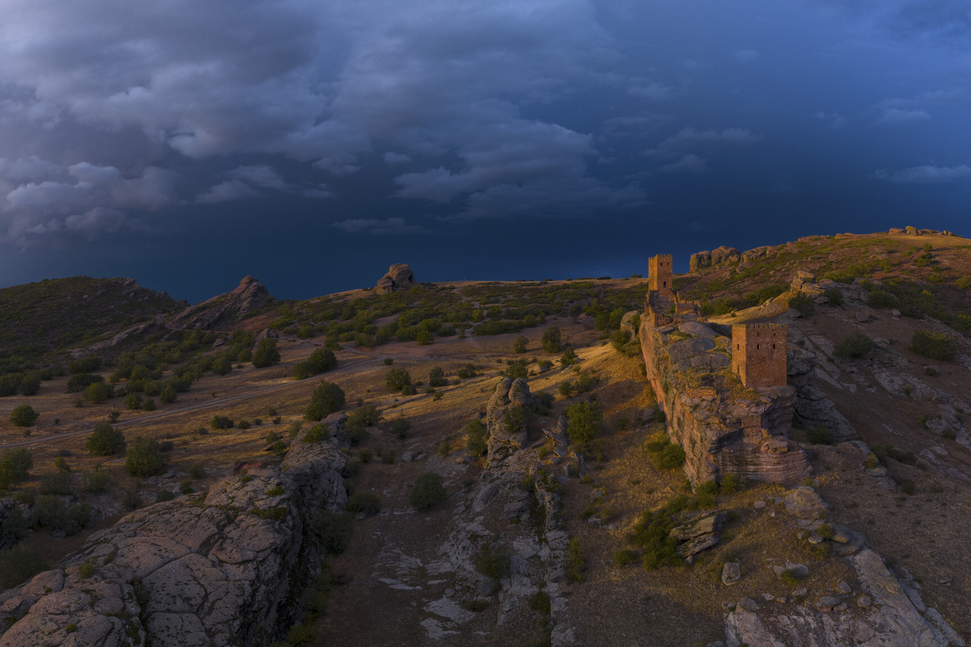 Sunset over the Castle of Zafra and the Sierra de Caldederos.