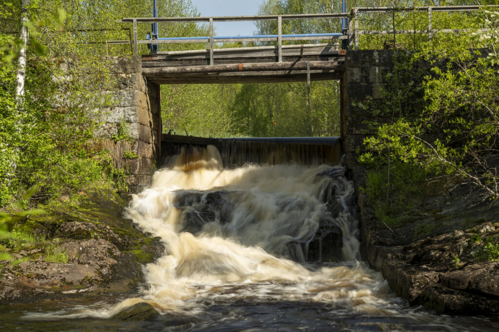 A small dam in a river system in the Nordic Taiga, Sweden.