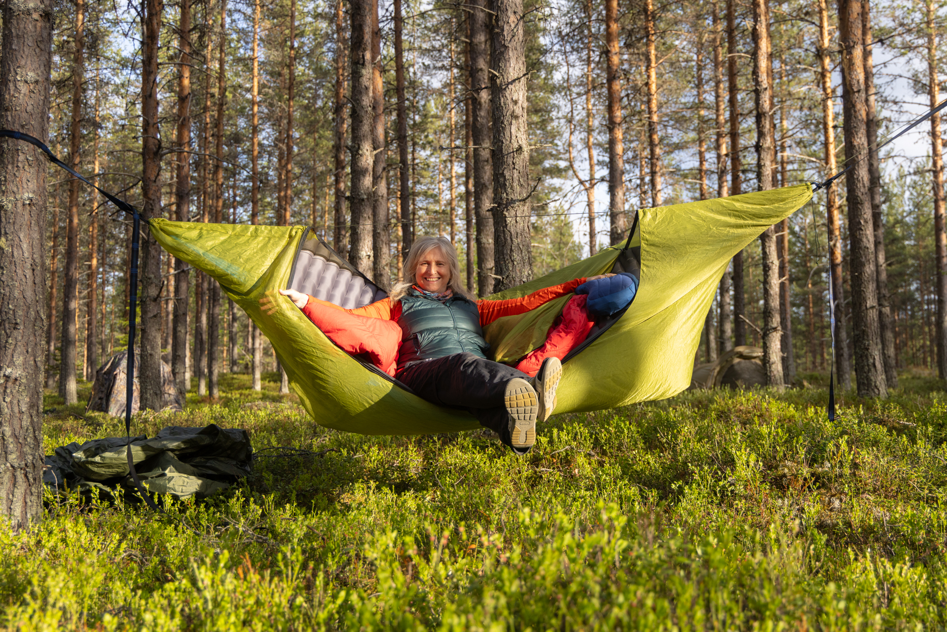 Woodland camping as part of a trial rewilding tourism trip, created by Wild Sweden and Rewilding Sweden. Nordic Taiga, Sweden.